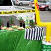 Beistle 2 Piece Mini Cascade Football Centerpieces Sports Game Day Party Supplies, 7.5″, Green/Brown/White
